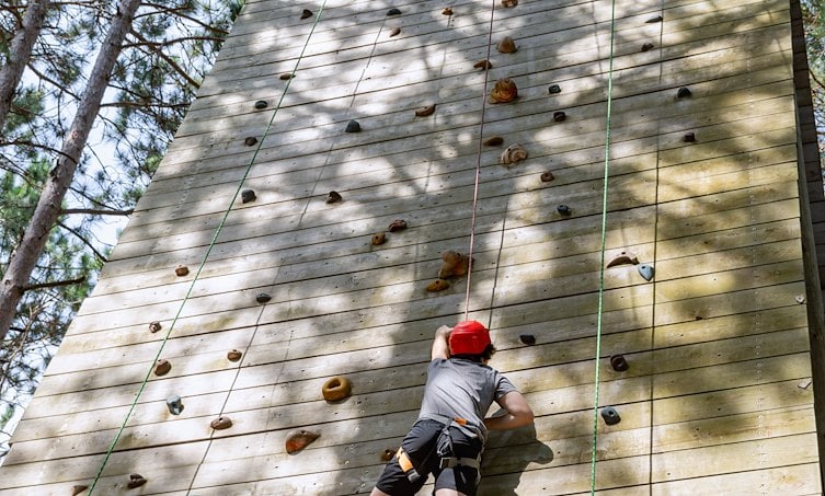 A person climbing a rock wall