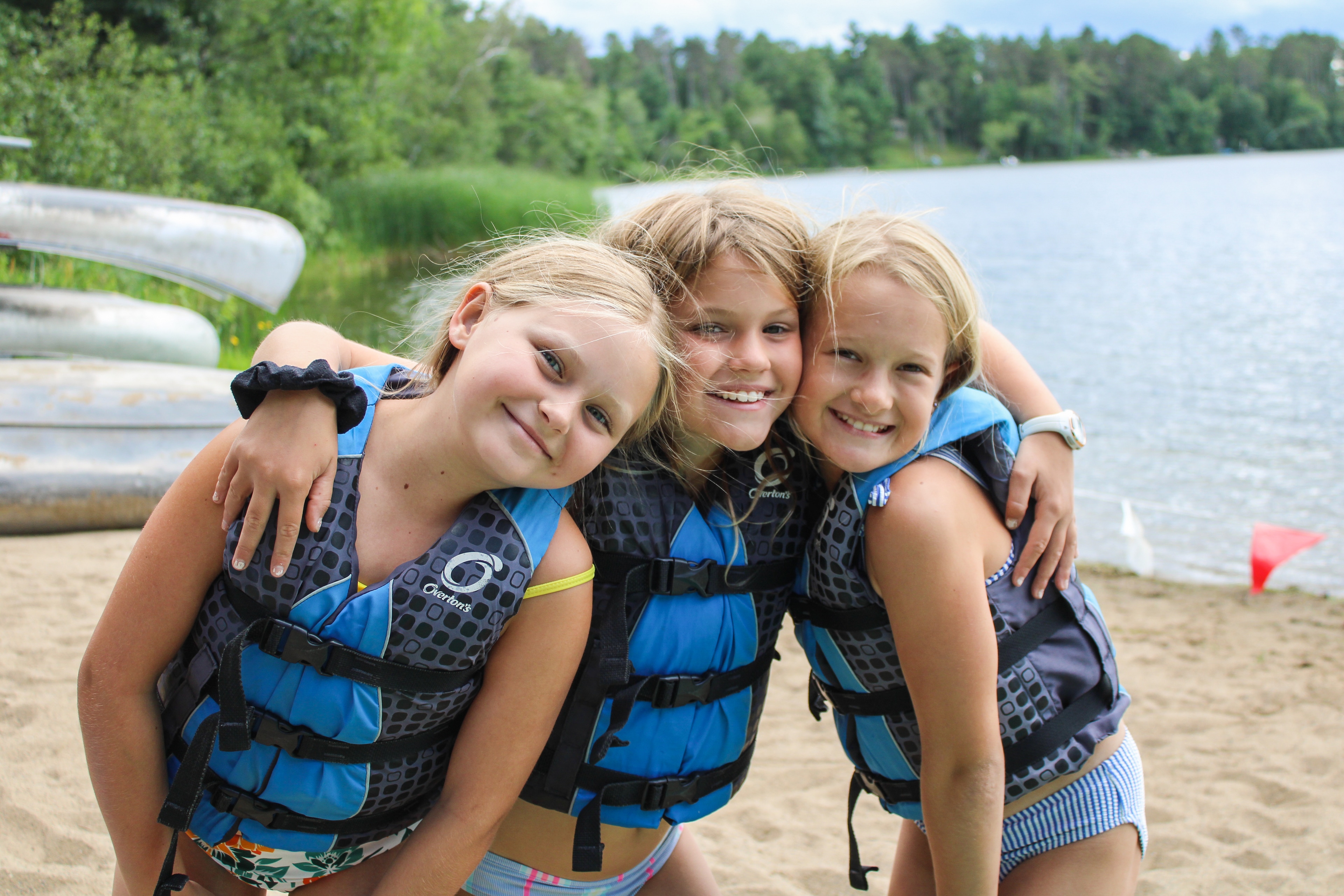 Camp Lake Hubert girl campers wearing life jackets