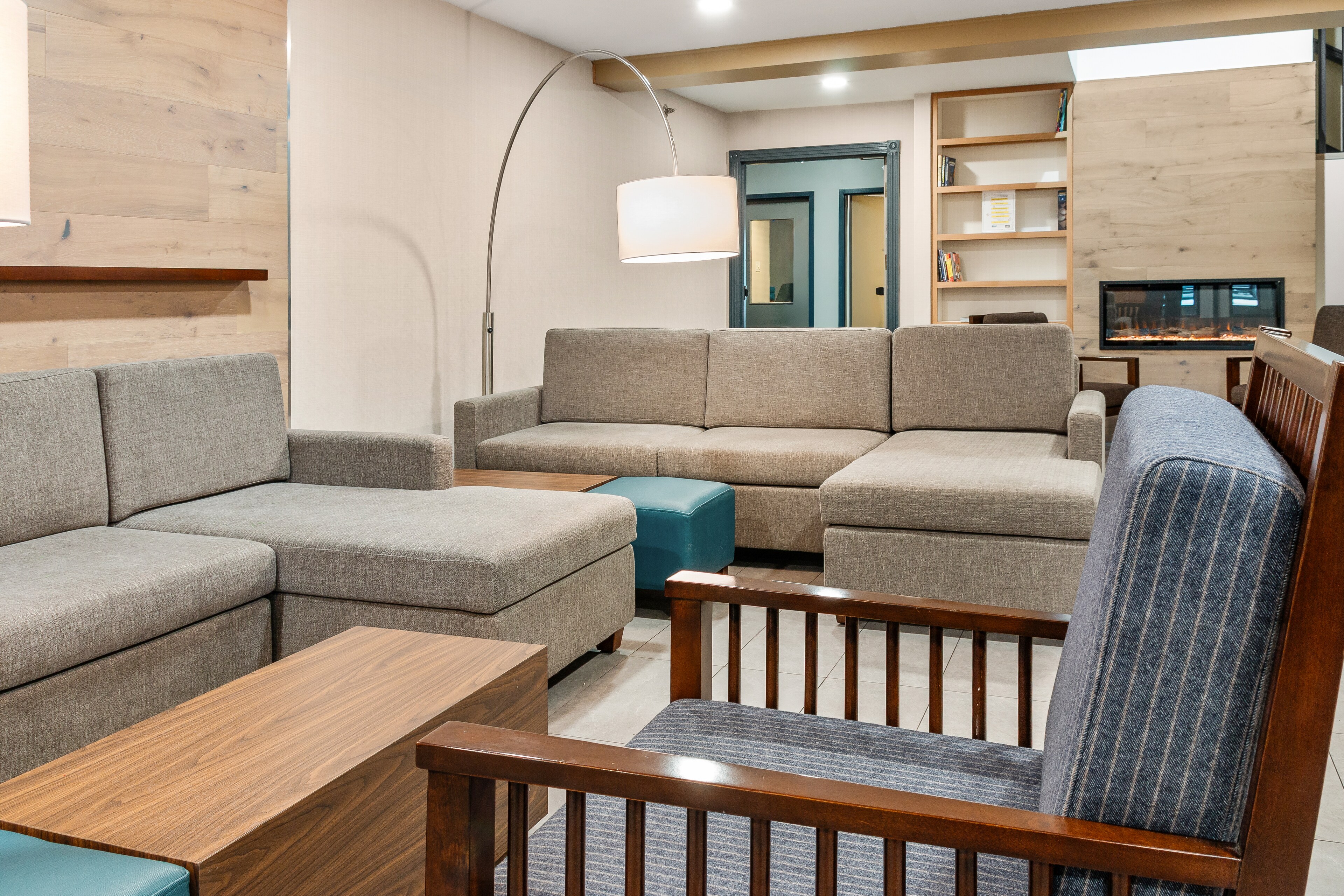 Modern lounge with beige sectional sofas