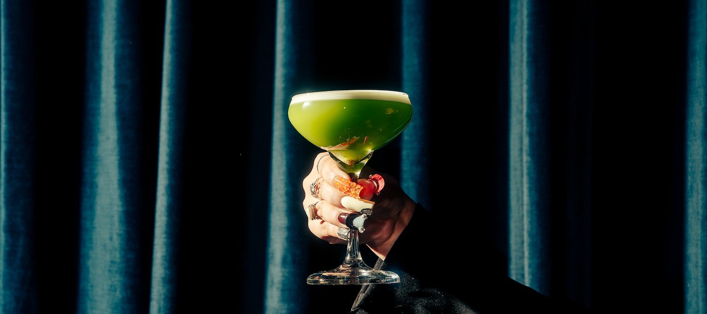 person holding drink, Nova Lounge at Vast, Oklahoma