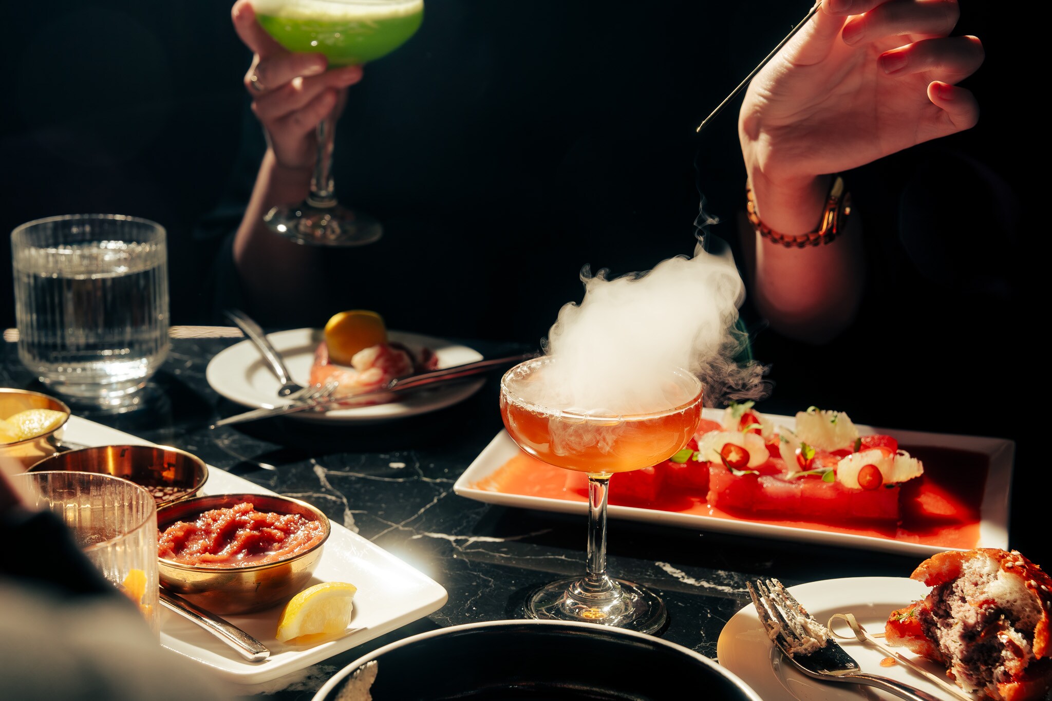 A table with food and drinks on it, Nova Lounge at Vast, Oklahoma