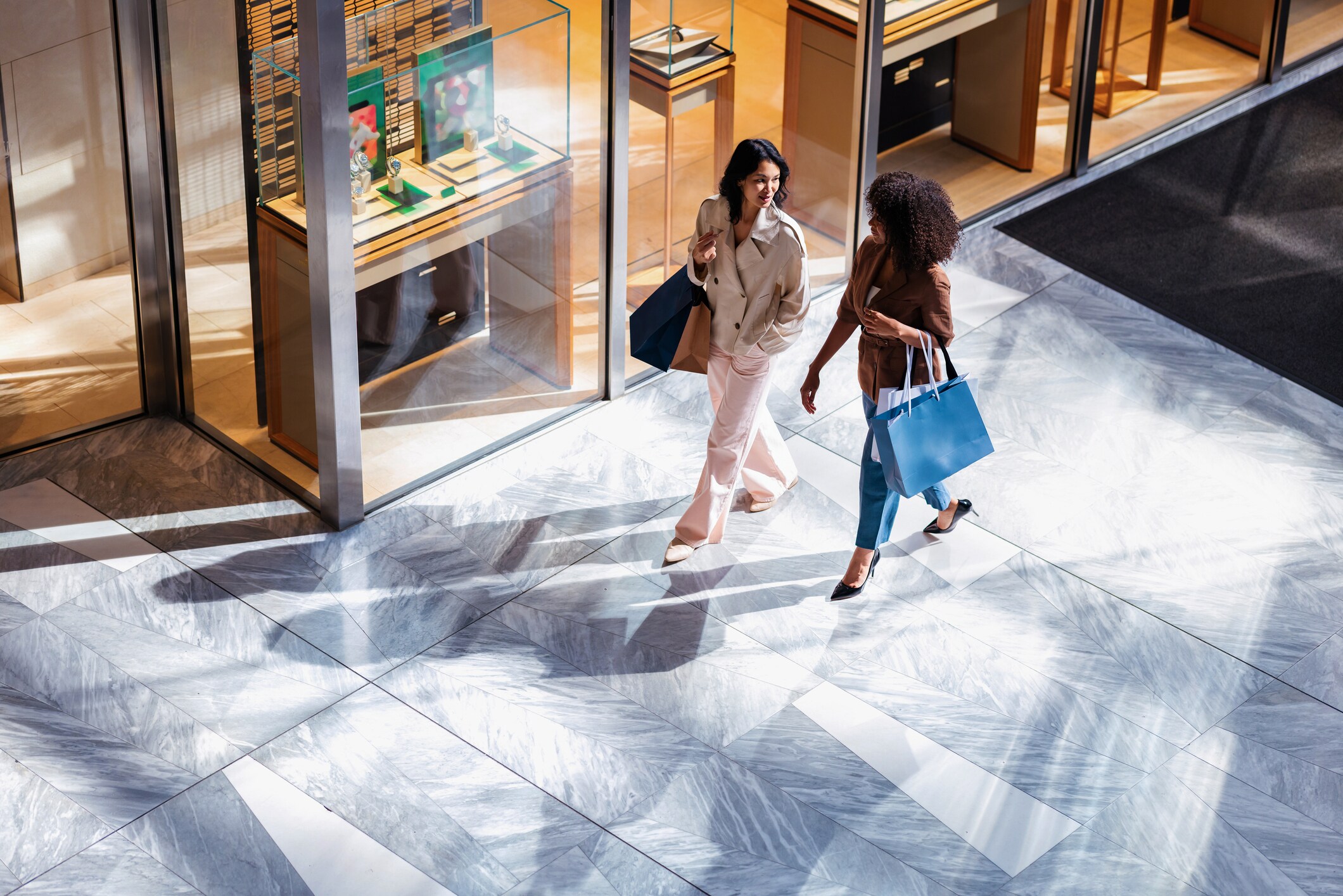 Two women shopping indoors in Ontario Street, Chicago, Illinois