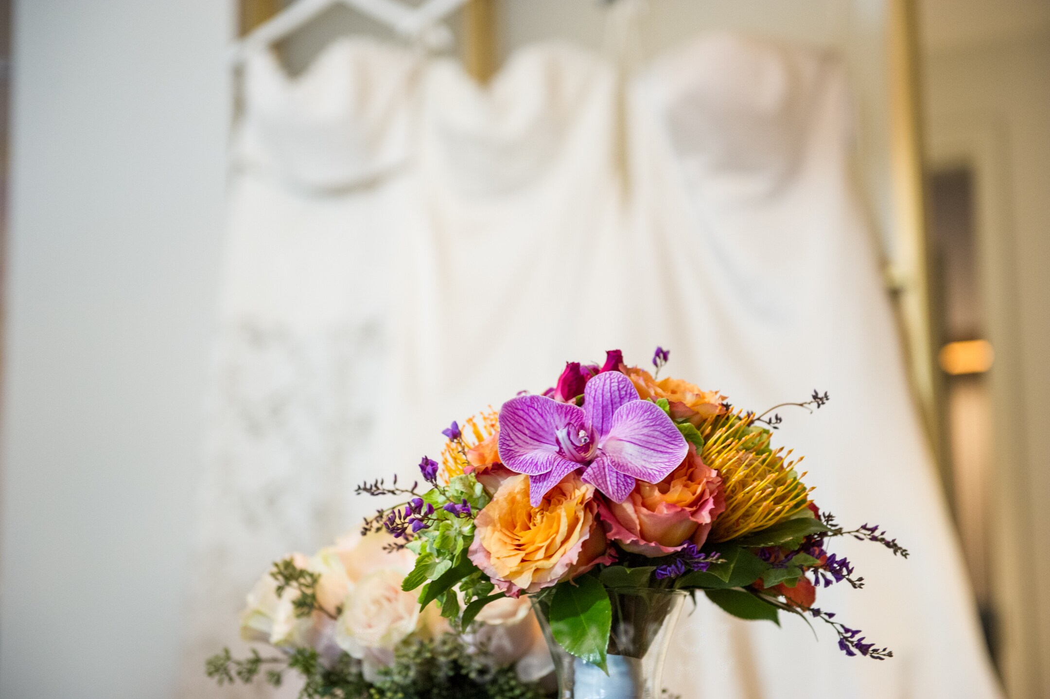 Vibrant bridal bouquet of purple orchids at The Rivvy Hotel in Ontario Street, Chicago, Illinois