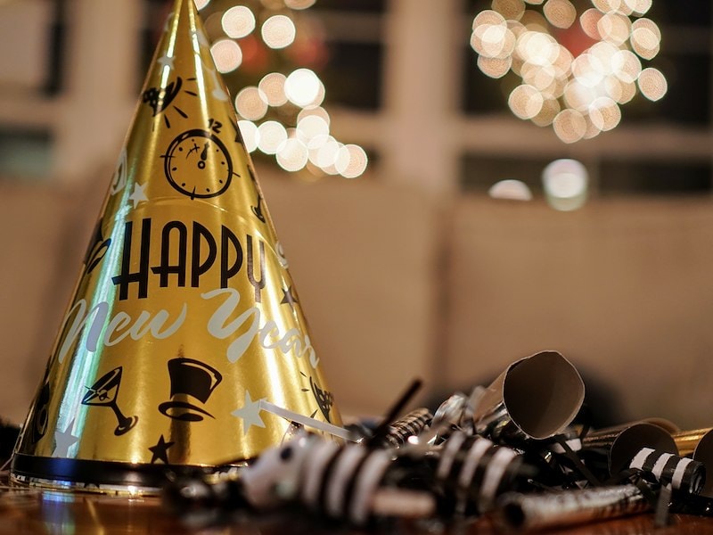 A gold party hat on a table for new year's holiday party