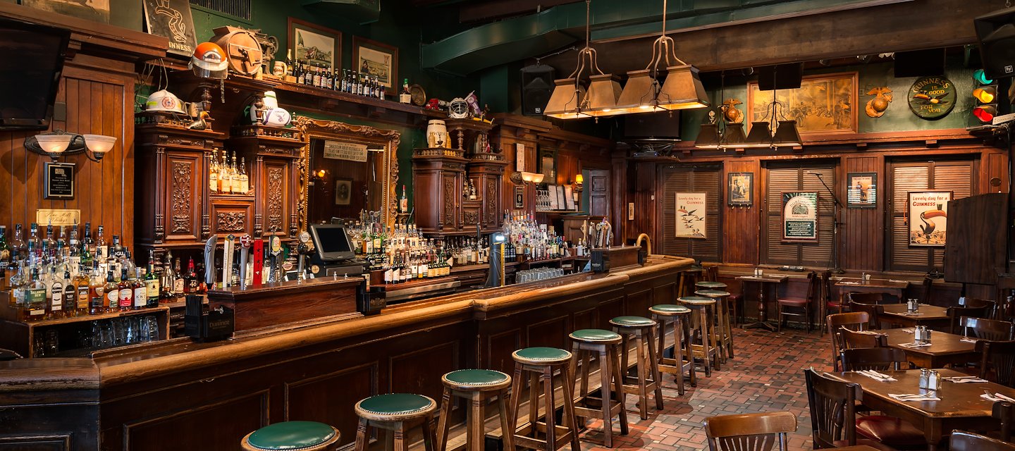 Warm and inviting Dubliner Bar at Phoenix Park Hotel, perfect for enjoying drinks and pub fare