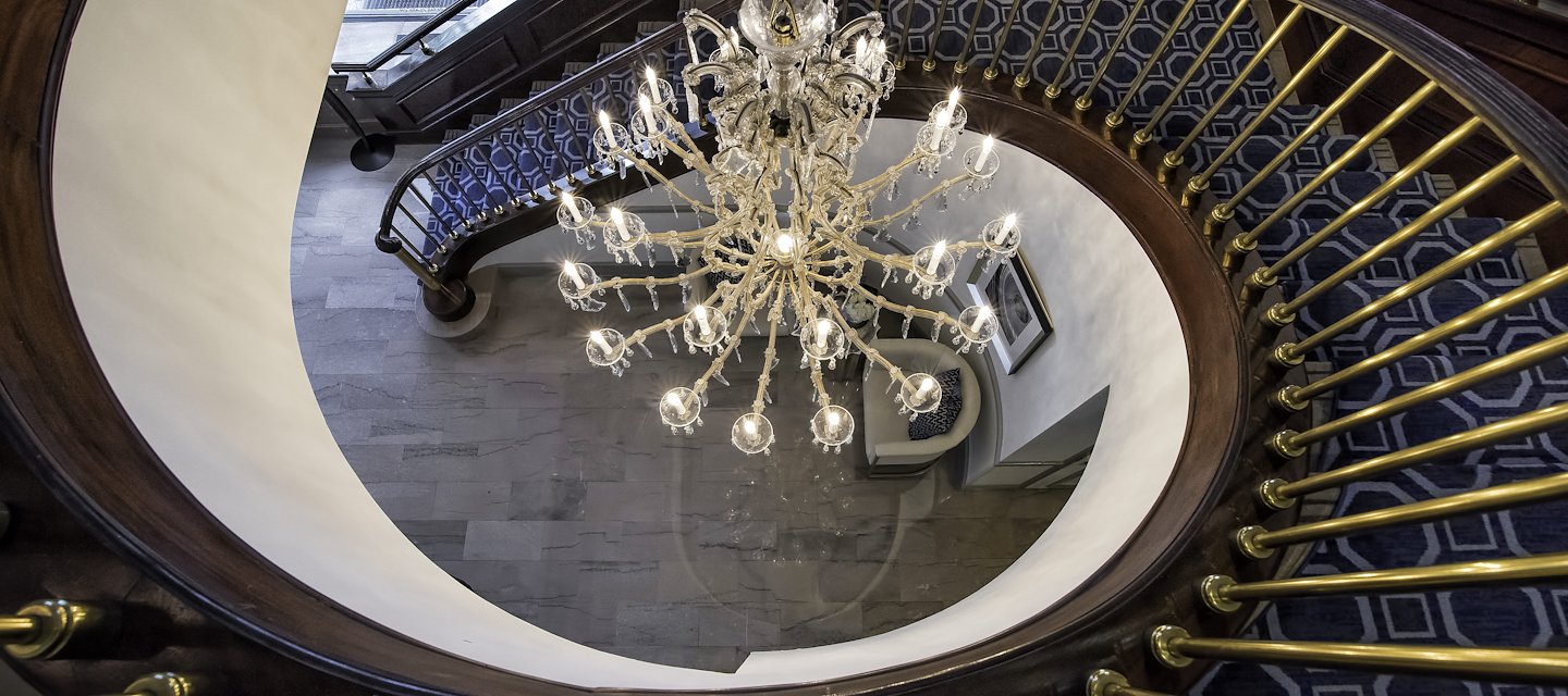 Phoenix Park Hotel staircase with elegant architectural detailing and soft lighting for a warm ambiance