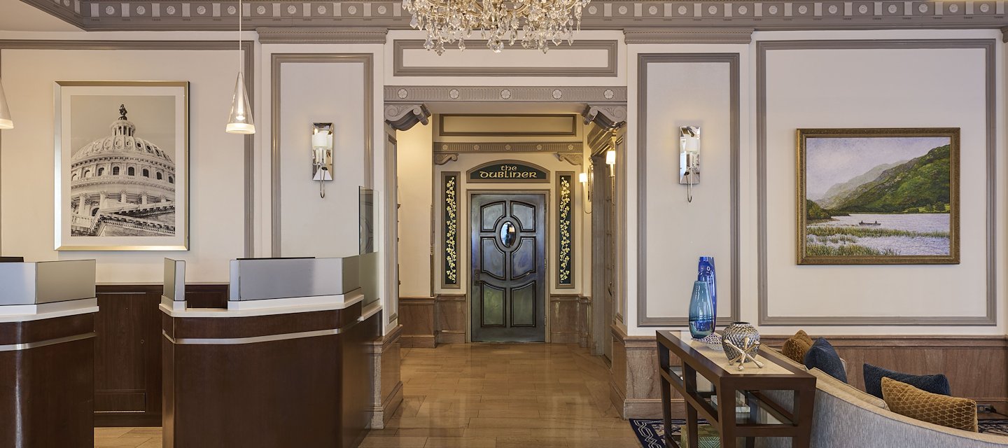 Main entrance lobby of Phoenix Park Hotel featuring luxurious seating and sophisticated ambiance