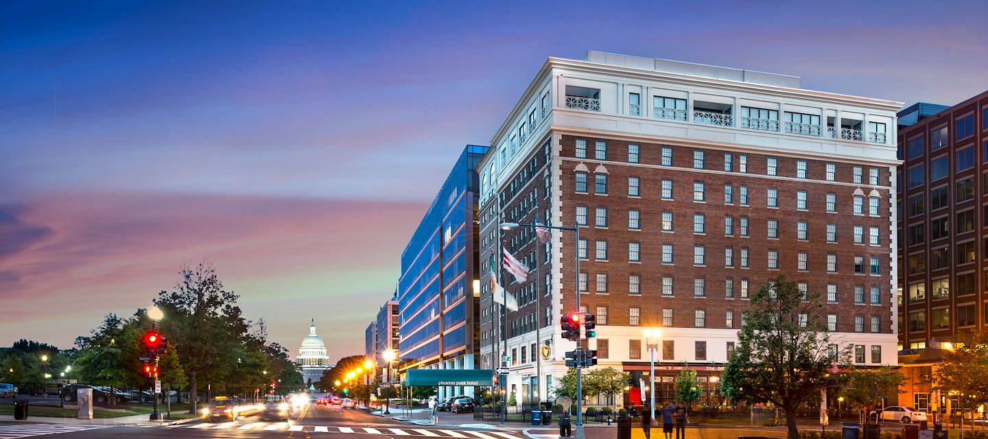 Exterior view showing the White House with the Phoenix Park Hotel visible in the distance in Washington, D.C.