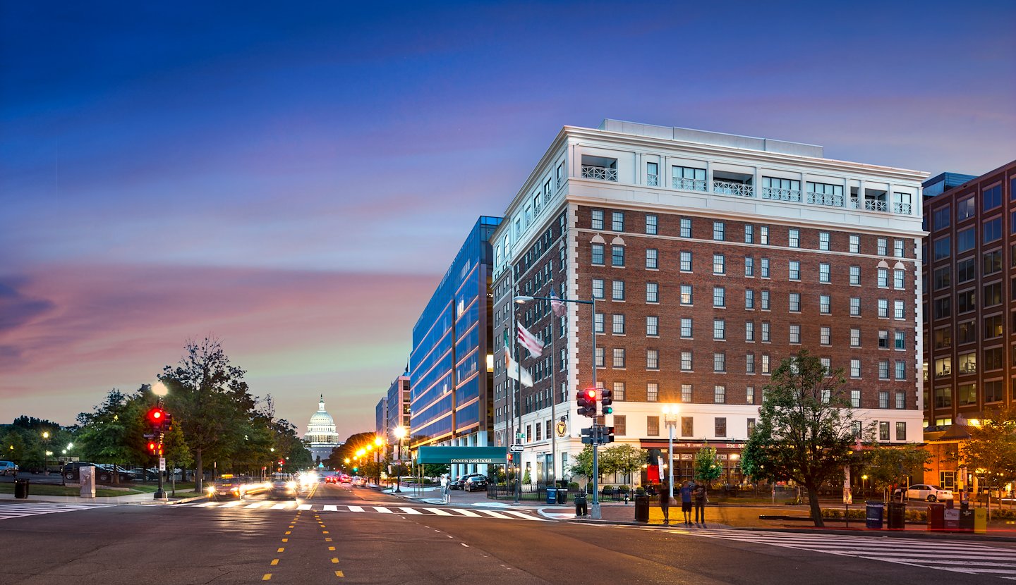Exterior view showing the White House with the Phoenix Park Hotel visible in the distance in Washington, D.C.