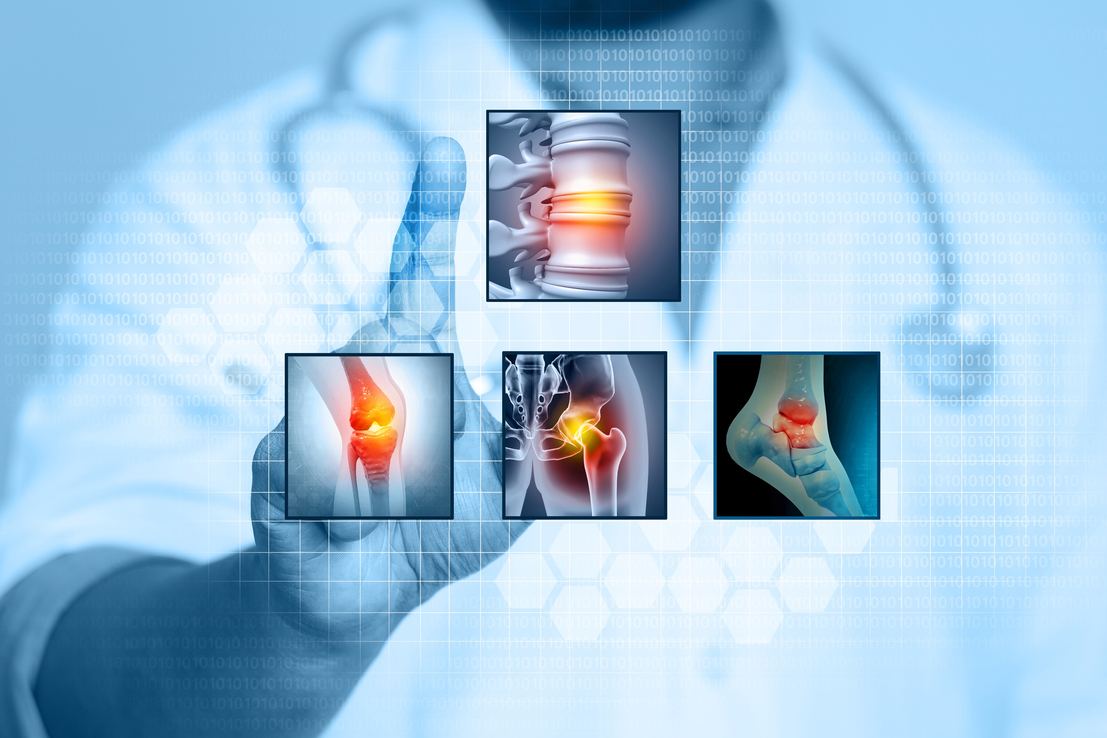 A doctor interacts with pain diagnosis images at Brij Medical Centre.