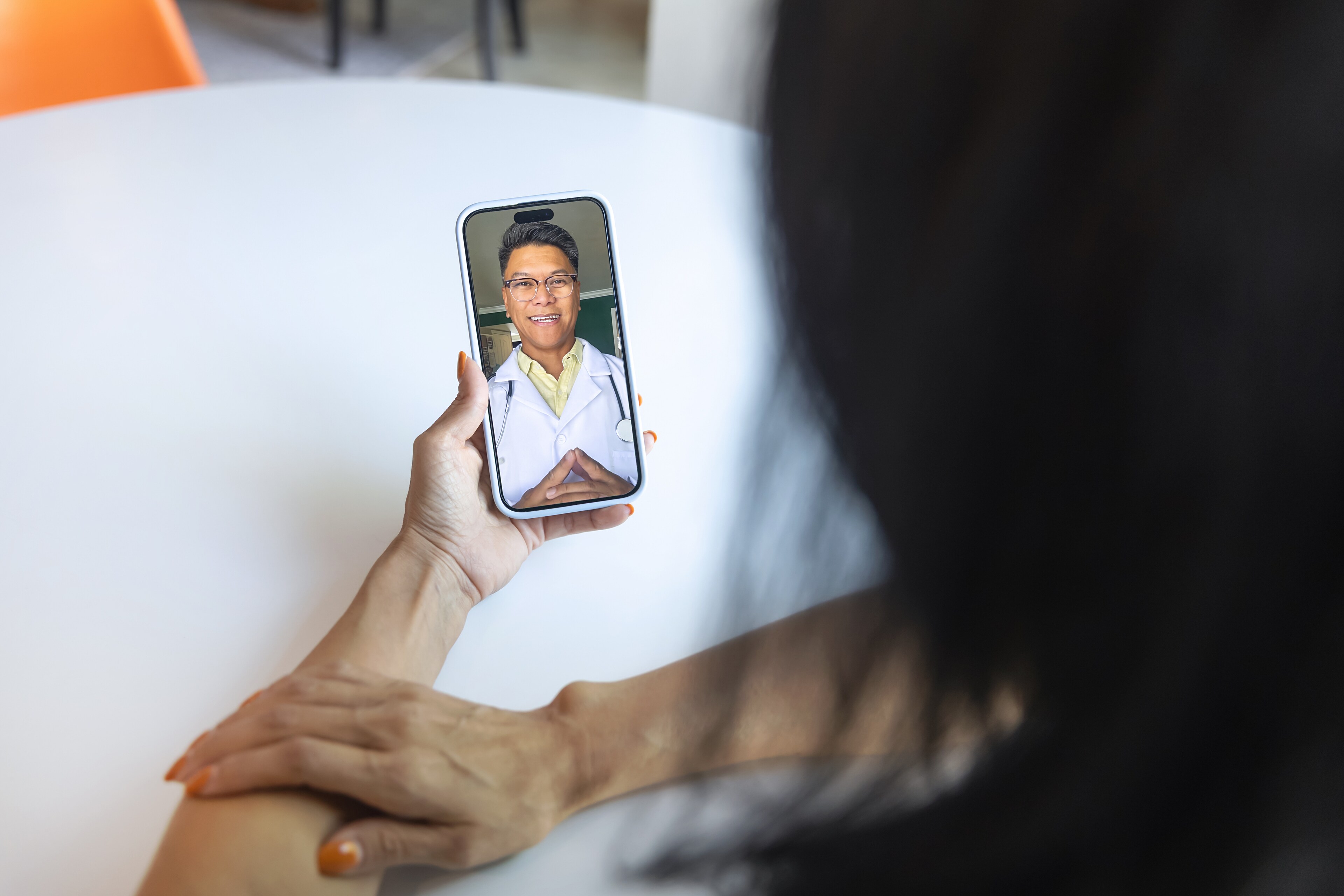 A patient consults a doctor via video call at Brij Medical Centre.