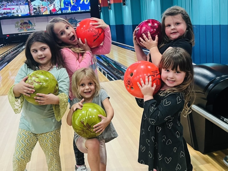 Group of young girls bowling at Fin City Bowling.the Ozarks.