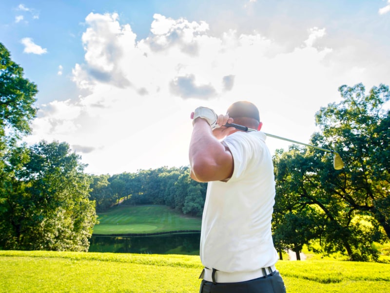 Golfer playing at The Oaks Golf Course