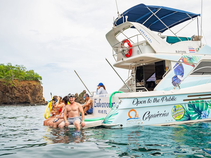 Margaritaville Costa Rica Yacht with people snorkeling
