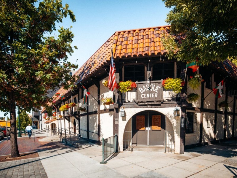 A building with flags on the front