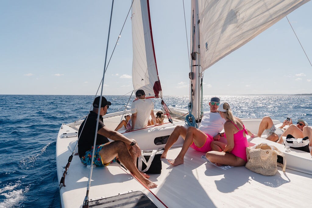 A group of people on a sailboat