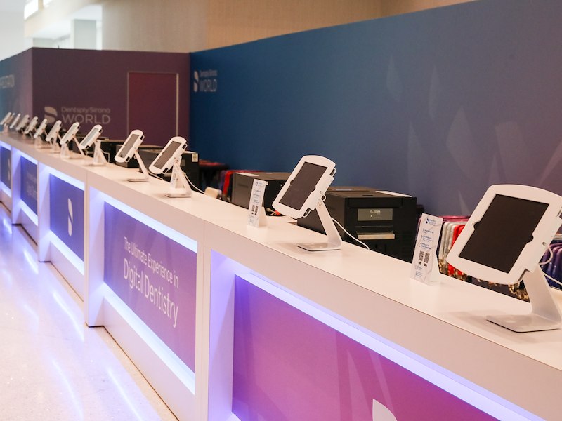 Attendee registration kiosks set up for event check-in.