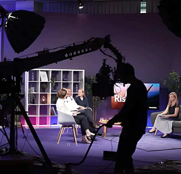 Production team of EMC Meeting & Events, Sea Girt, New Jersey managing a small group discussion on set