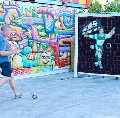 Gamification & Activation Event, Man plays football EMC Meeting & Events, Sea Girt, New Jersey