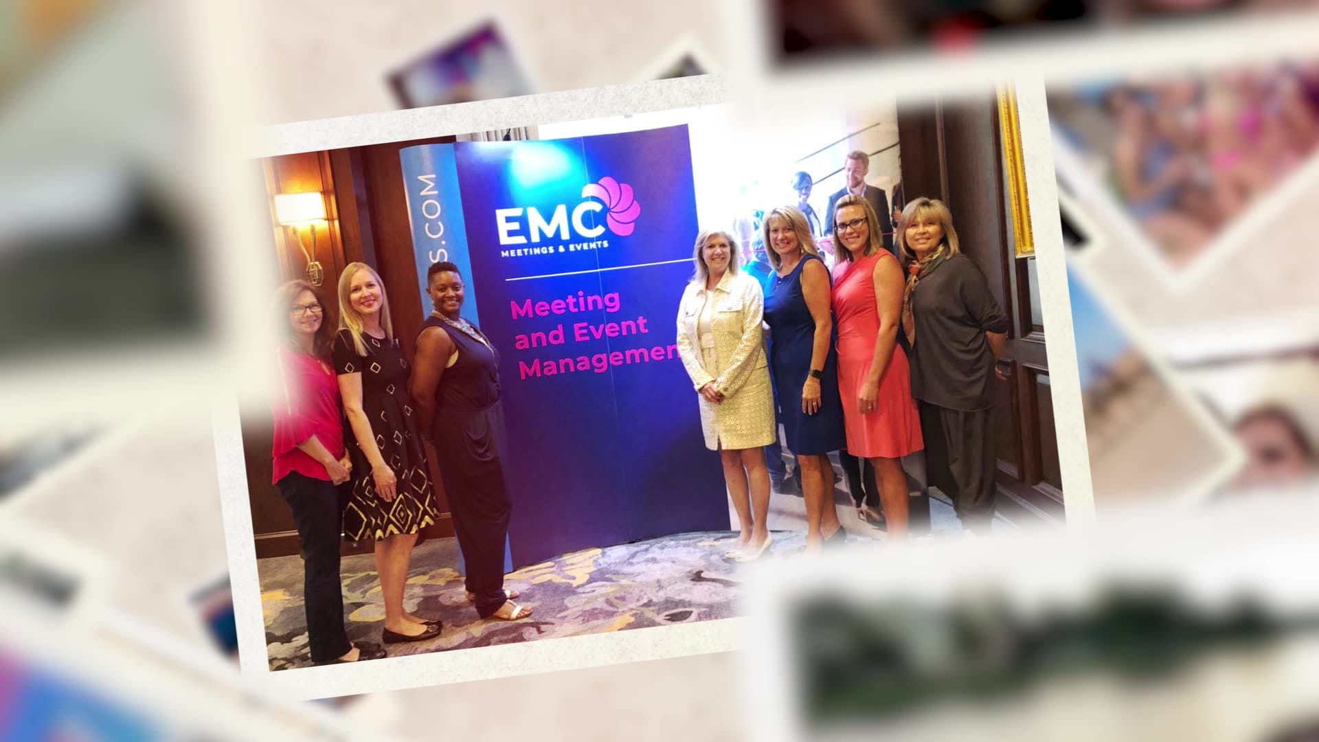 A group of women standing in front of a sign