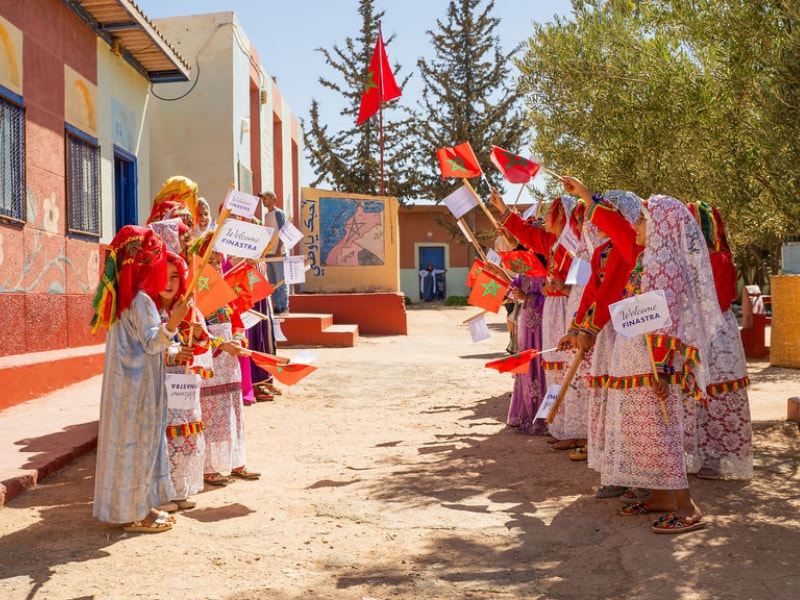 Community event with traditional welcome ceremony outdoors