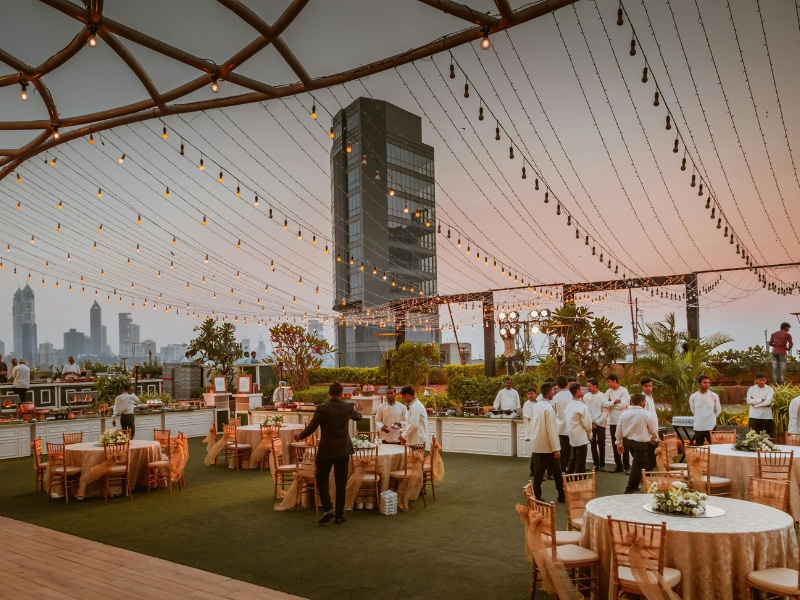Rooftop Event Overlooking a City Skyline
