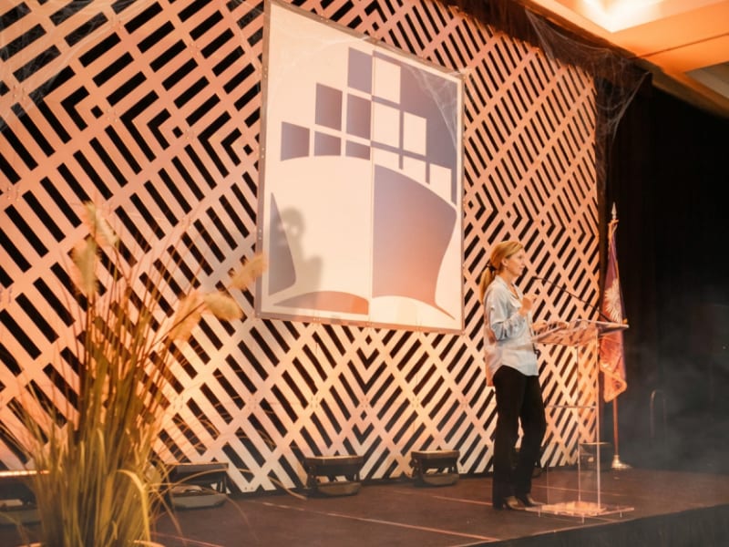 Speaker presenting on stage