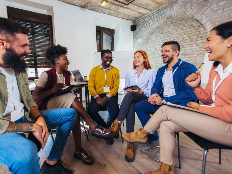 A group of people sitting in a circle