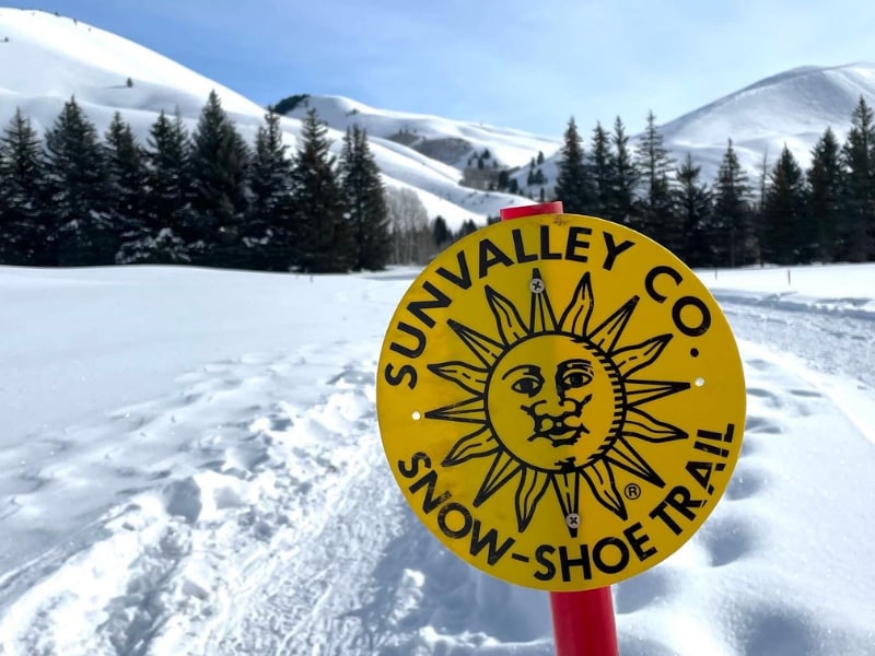 A yellow sign in the snow