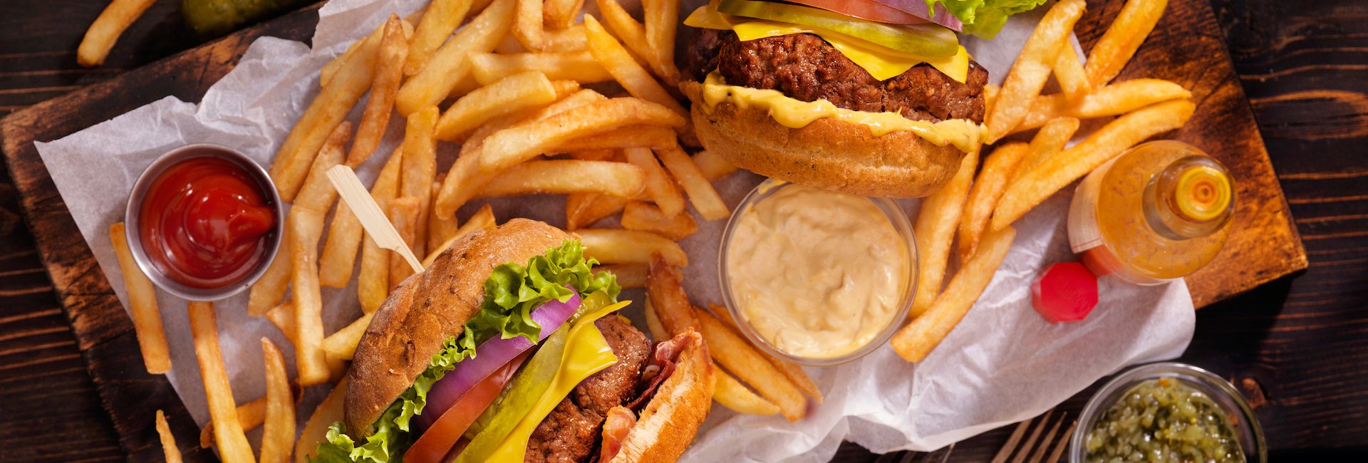 Delicious burgers and fries served.