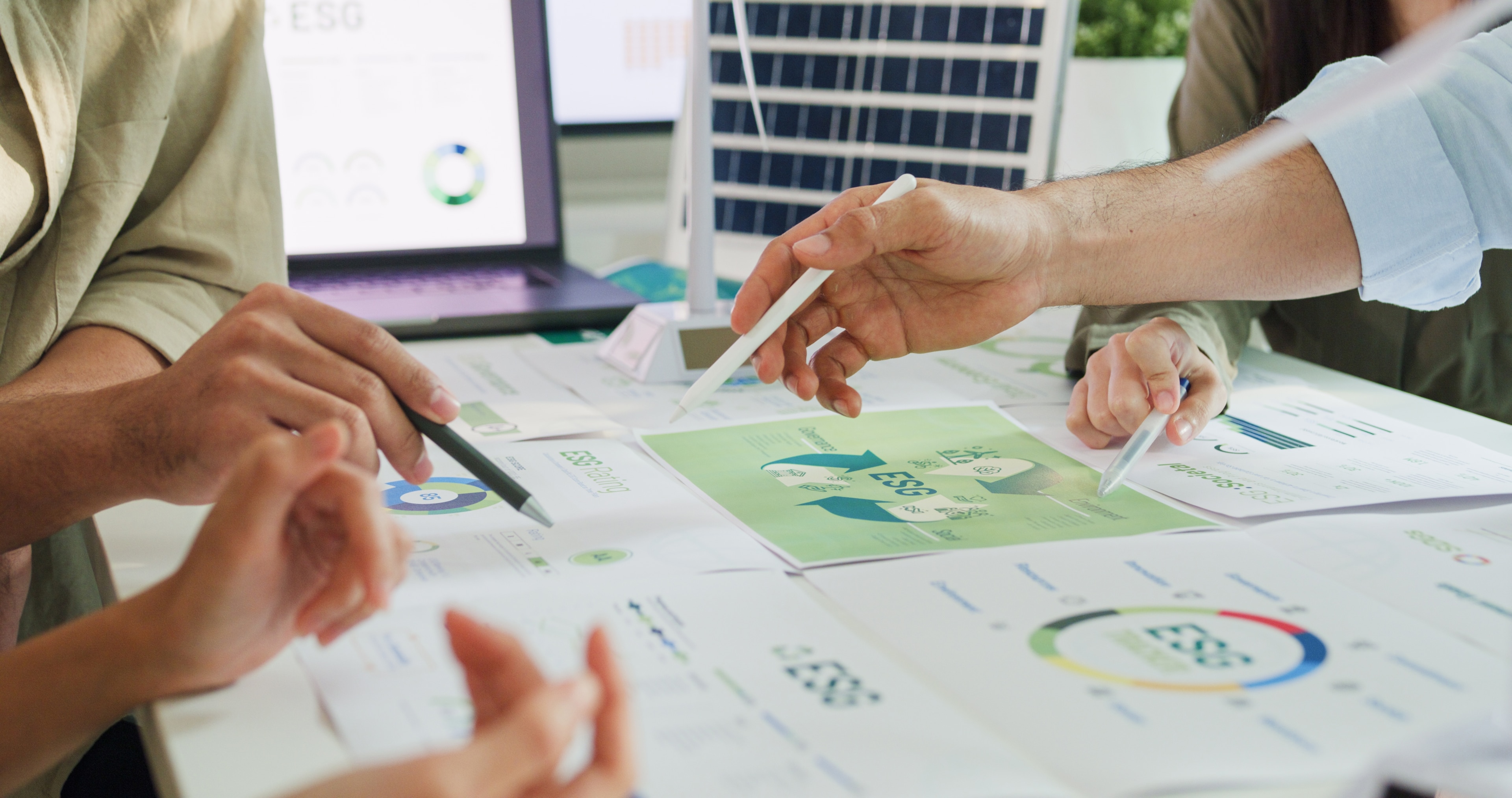 A team reviewing reports