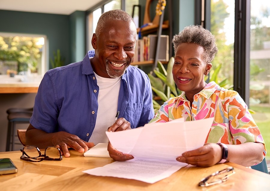 Couple reviewing personal loan options.