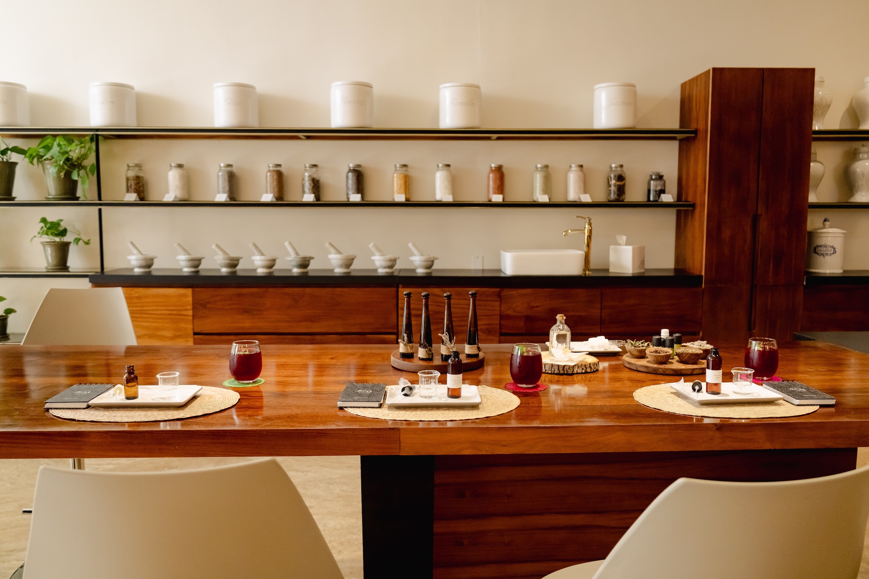 A table with a variety of bottles on it