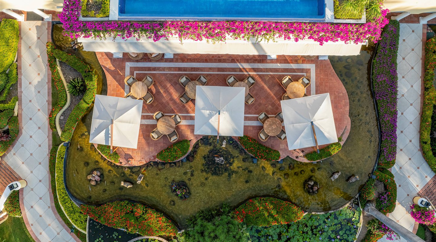 An aerial view of a garden with a pool and a fountain, Casa Velas, Puerto Vallarta, Mexico
