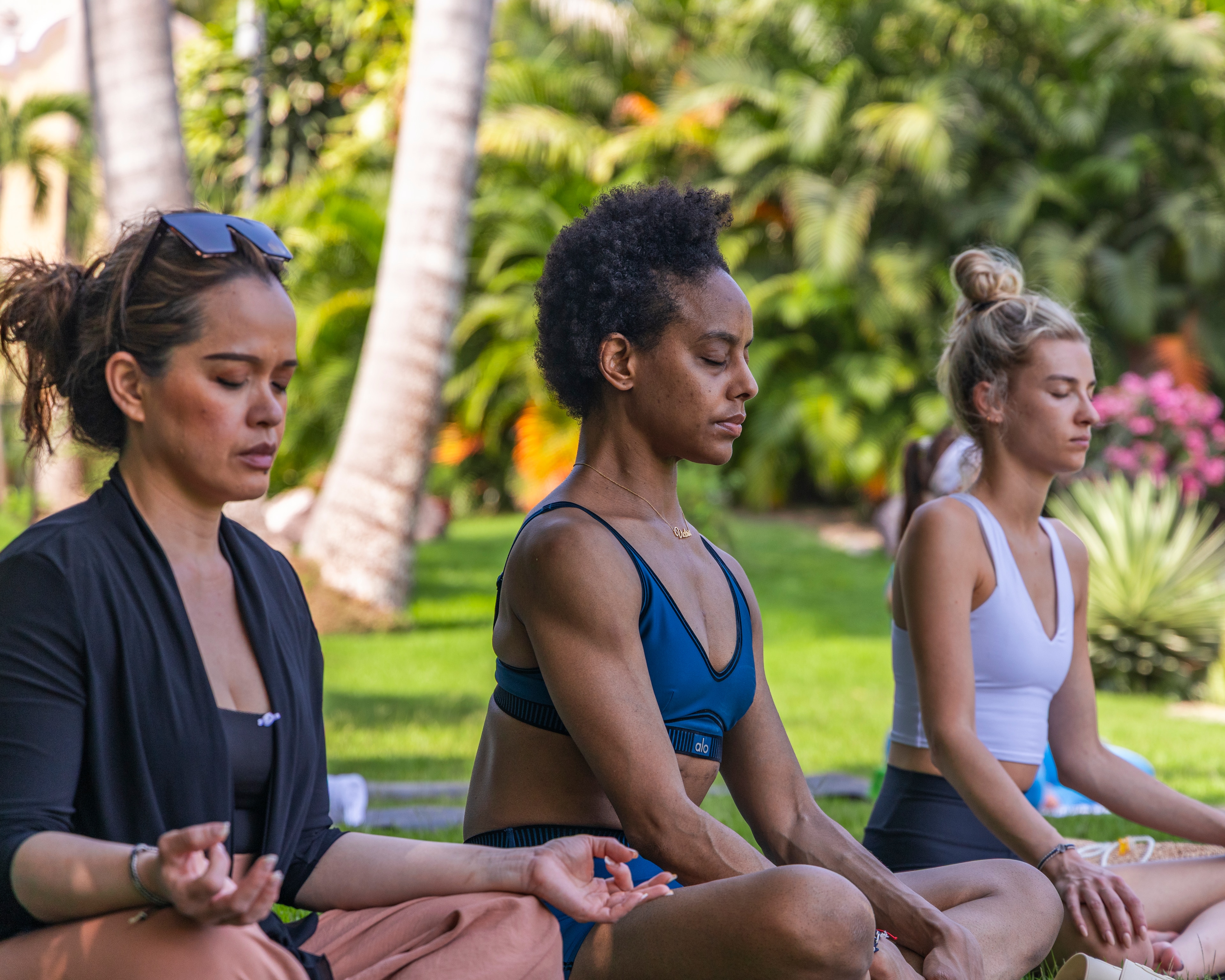 a group of women meditating