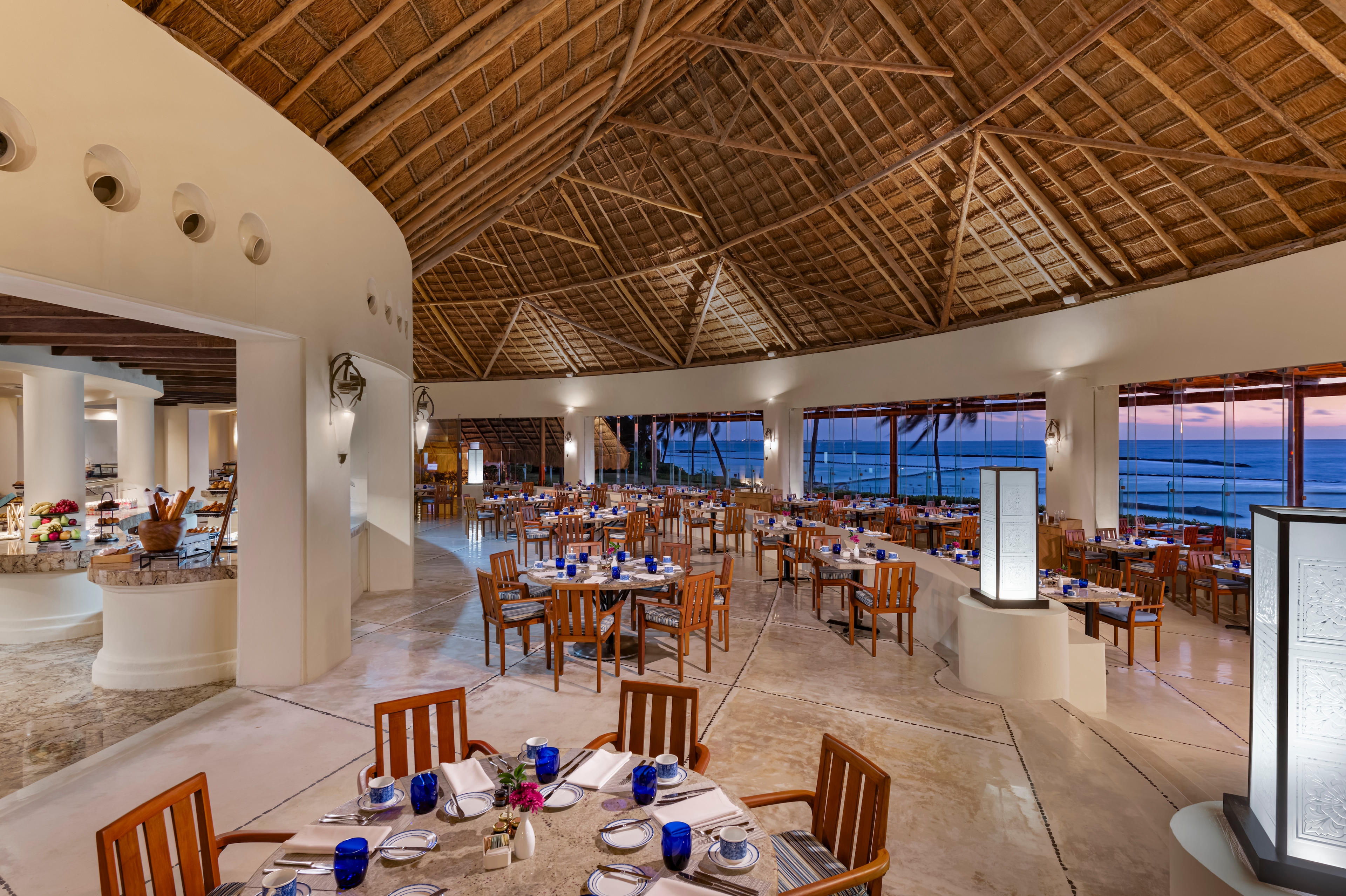 A restaurant with a large dining area overlooking the ocean, Grand Velas Riviera Maya, Playa del Carmen, Mexico