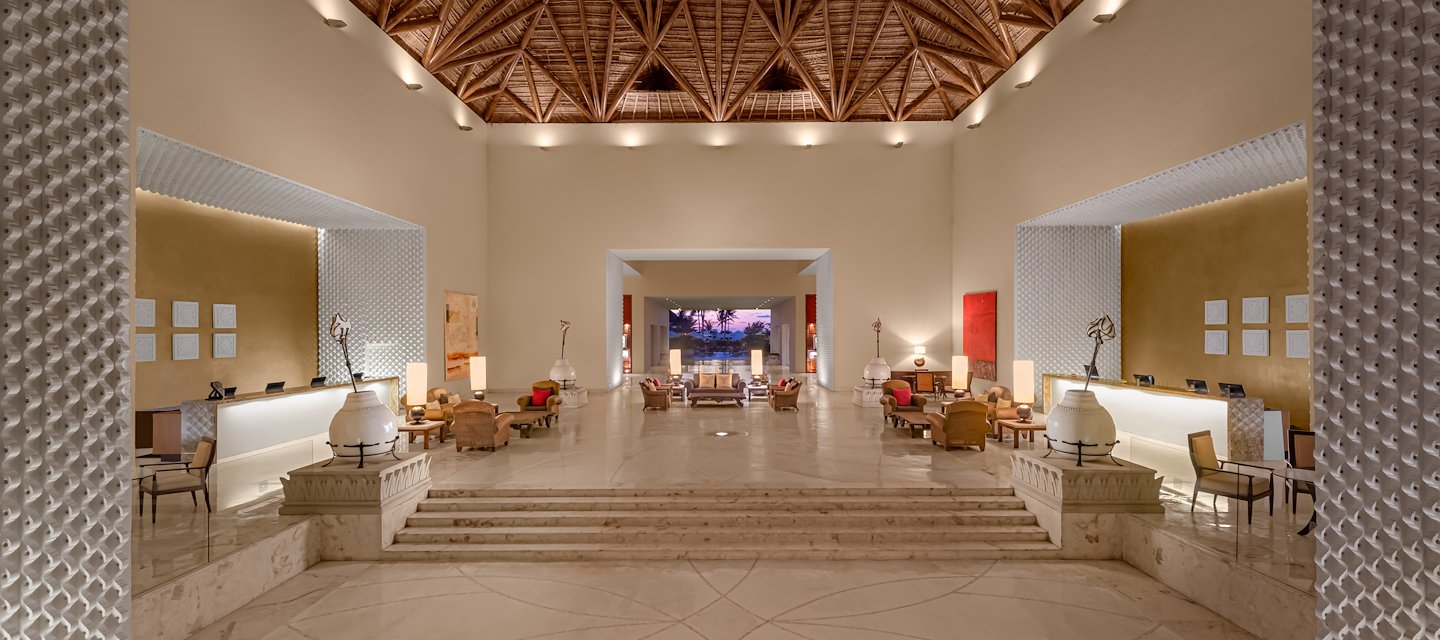 The lobby of a hotel with a large ceiling, Grand Velas Riviera Maya, Playa del Carmen, Mexico