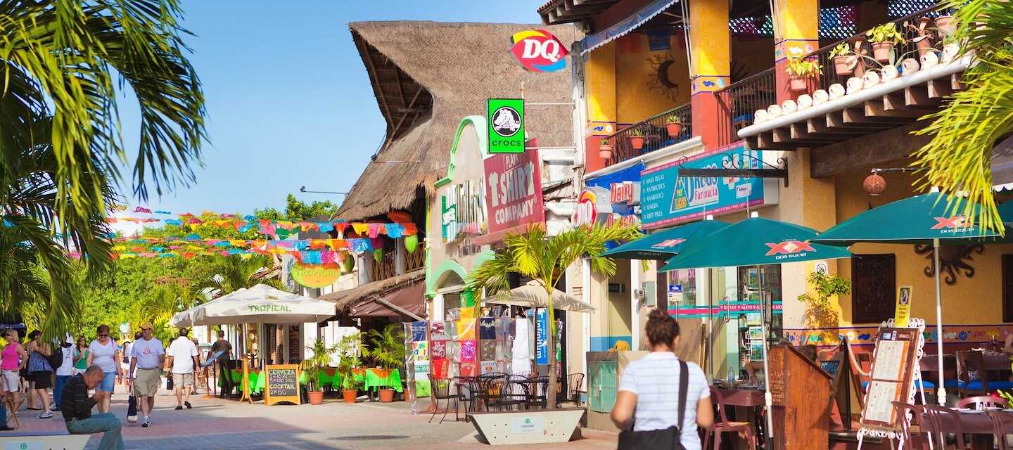 A woman walking down a street