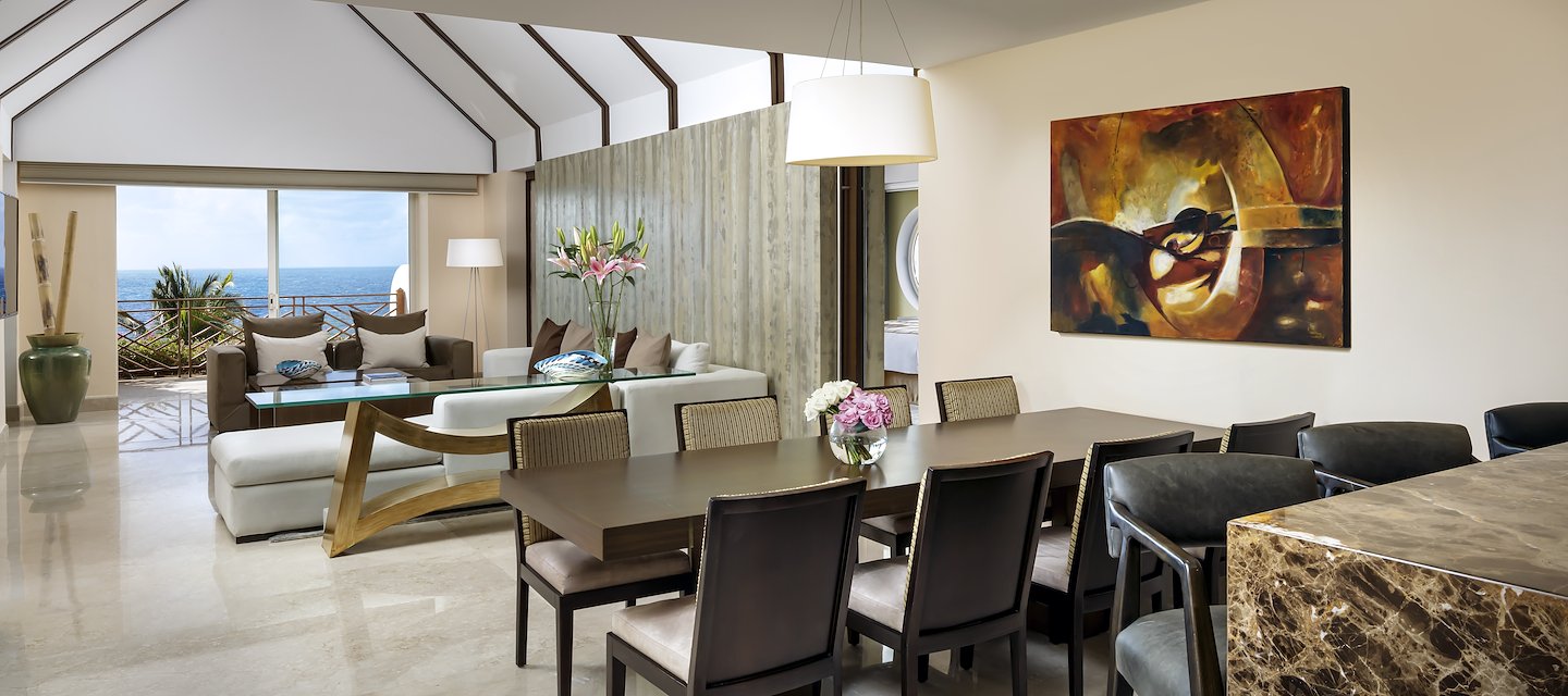 A large dining room with a large painting on the wall, Grand Velas Riviera Maya, Playa del Carmen, Mexico