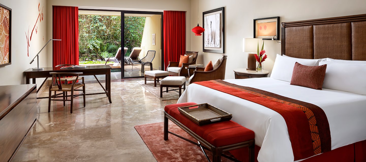 A hotel room with a bed, a chair, a table and a balcony, Grand Velas Riviera Maya, Playa del Carmen, Mexico