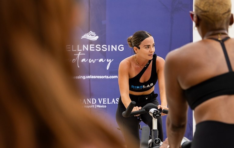 a woman cycling at Grand Velas Riviera Nayarit