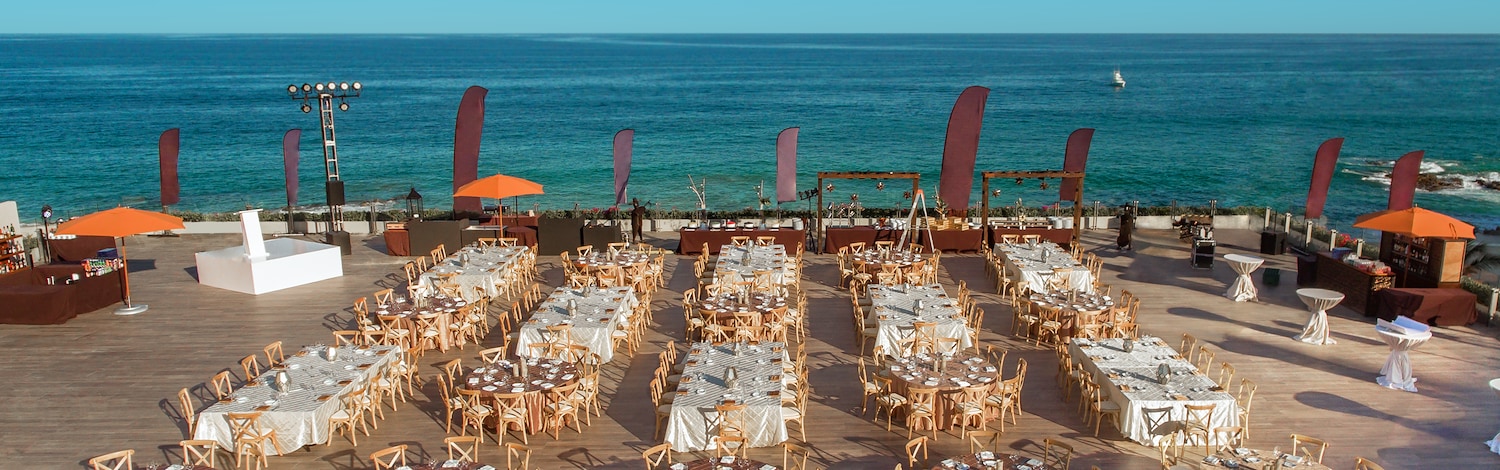 A wedding reception on the beach with tables and chairs, Grand Velas Los Cabos, San Lucas, Mexico