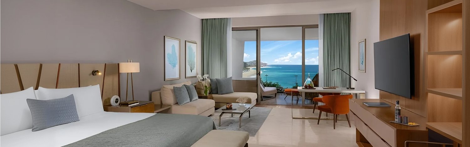 A large hotel room with two beds and a view of the ocean, Grand Velas Los Cabos, San Lucas, Mexico