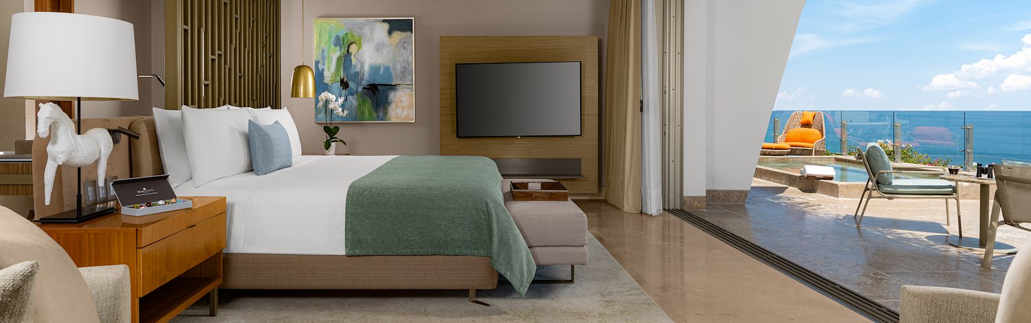 A bedroom with a view of the ocean and a balcony, Grand Velas Los Cabos, San Lucas, Mexico