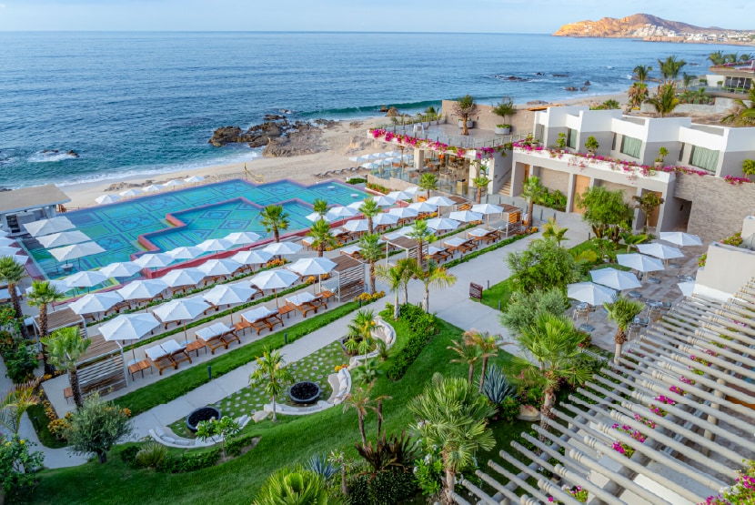 A resort with a pool and chairs