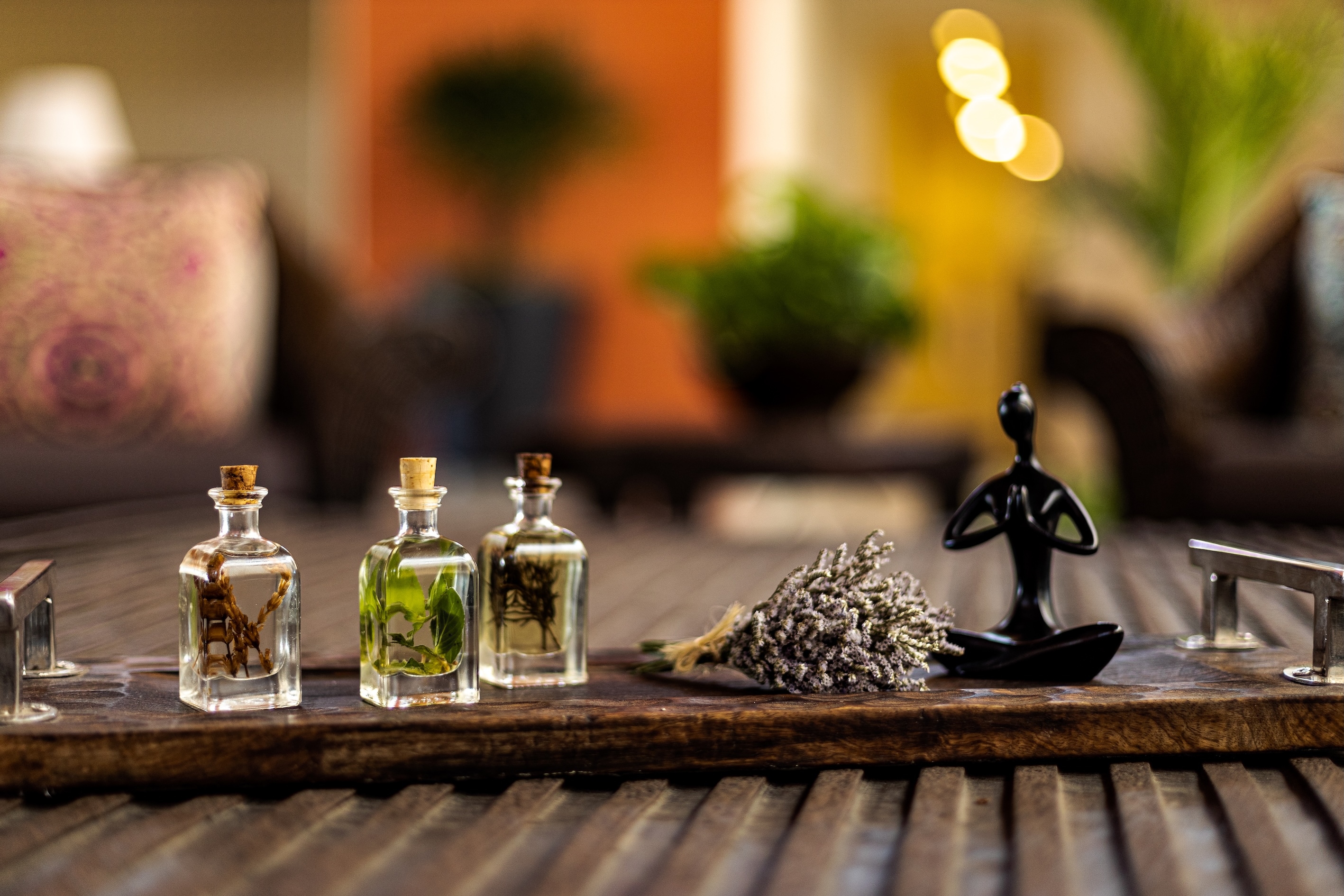 essentials oils sitting on wood