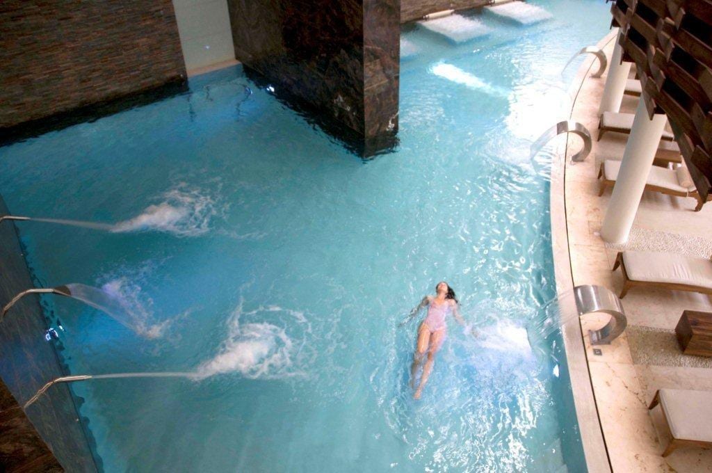 A woman swimming in a pool