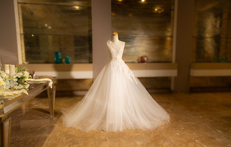A white wedding dress on a mannequin