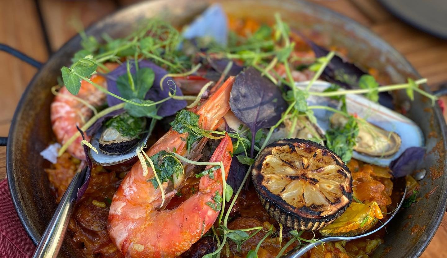A large pan with seafood and vegetables on a table, Casa Munras Garden Hotel & Spa, Monterey, California