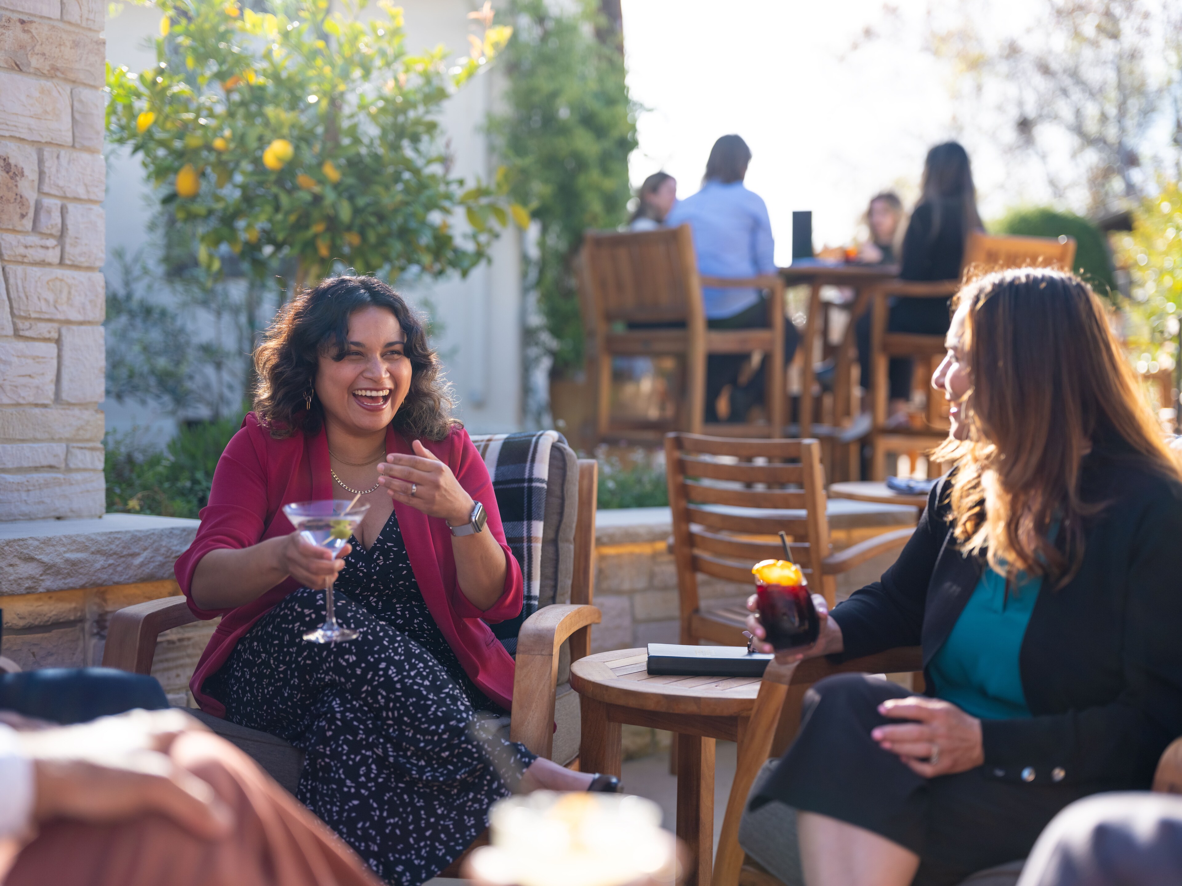 A group of women sitting outside in an outdoor area, Casa Munras Garden Hotel & Spa, Monterey, California